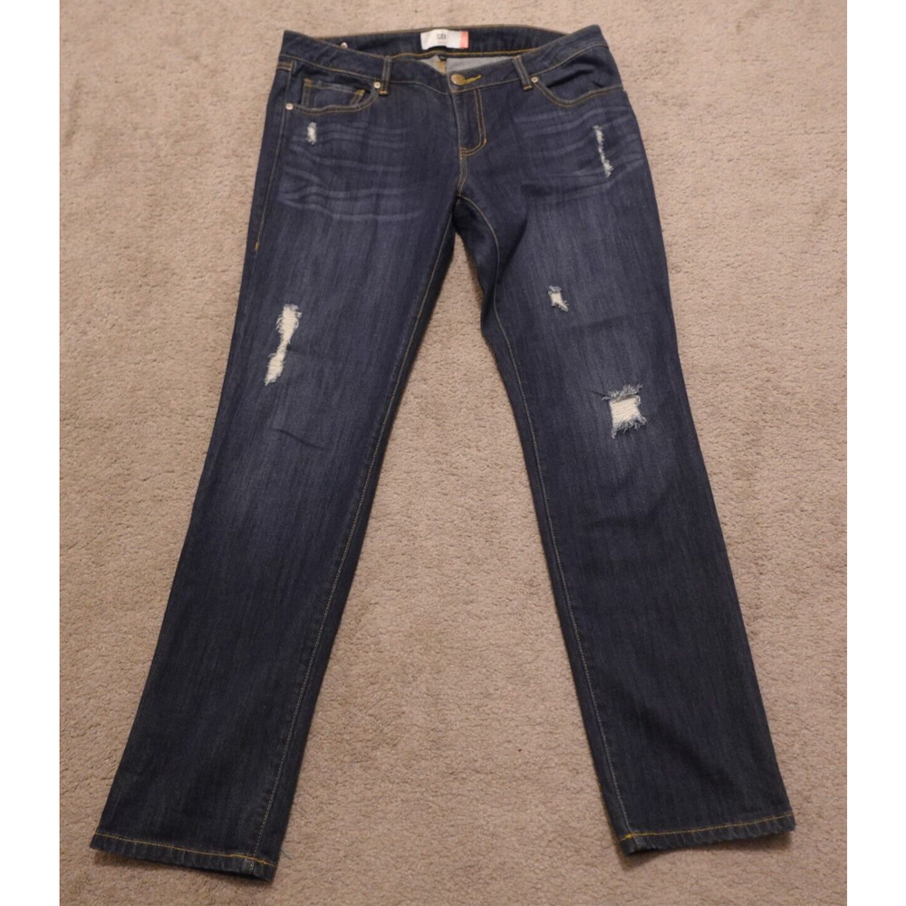 CAbi Women's Skinny Jeans in Dark Indigo with Distressed Details